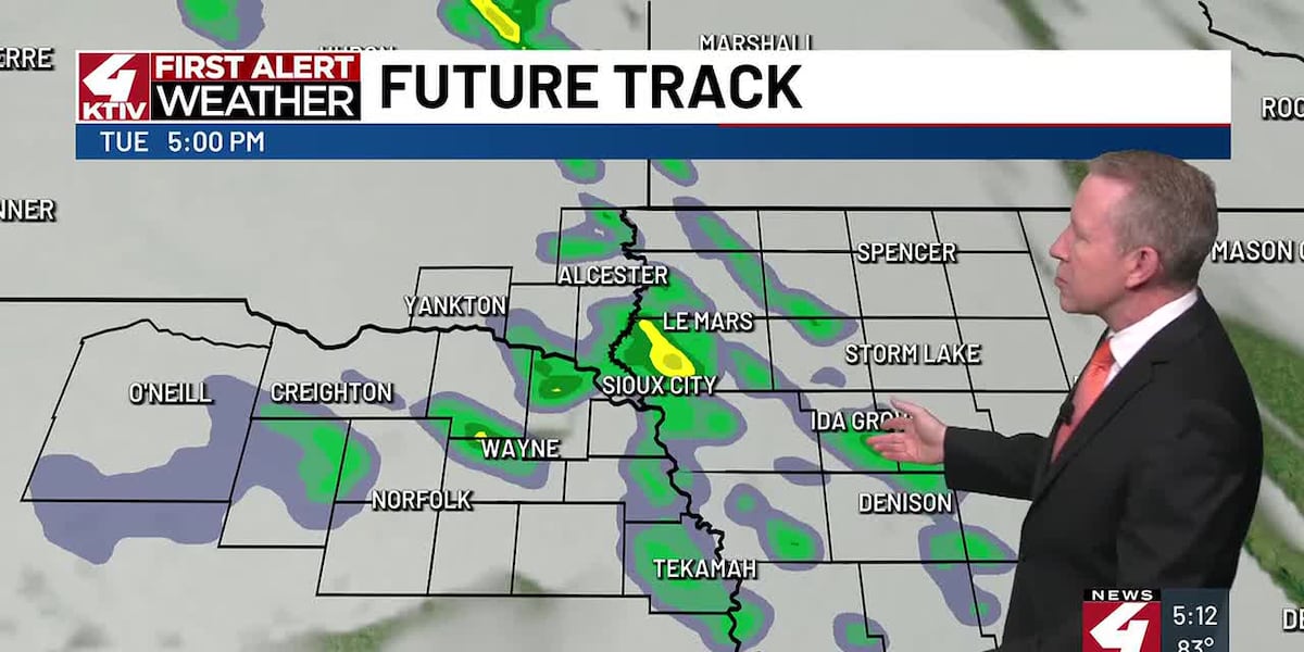 Warming moves in along with a couple of rain chances