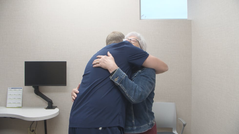 Joel Kraayenbrink reunited with his patient Sande Geidl during our interview.